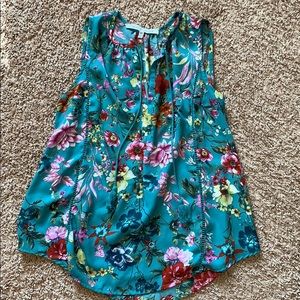 Split neck blouse with tassels